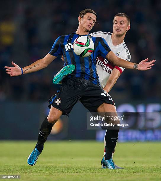 Samuele Longo of FC Internazionale Milano competes for the ball with Alex Rodrigo Dias Da Costa of AC Milan during the AC Milan vs FC Internacionale...