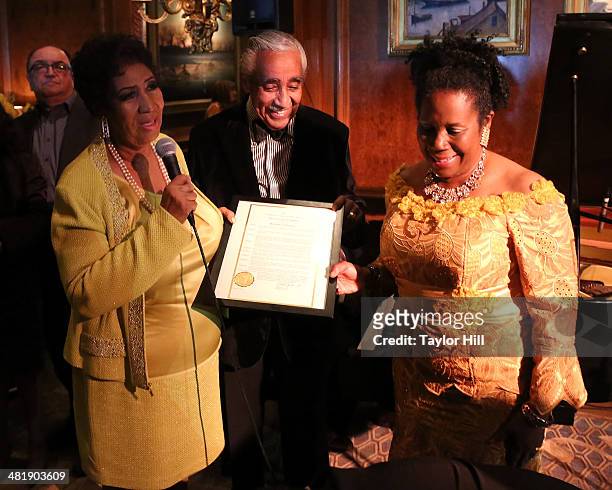 Aretha Franklin accepts a resolution honoring her birthday week presented by Representatives Charles Rangel and Sheila Jackson Lee at Aretha...