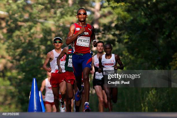 Cuba's Richer Perez leads the pack during the running of the men's marathon at the Pan Am Games, July 25, 2015 in Toronto, Canada. Perez won the gold...