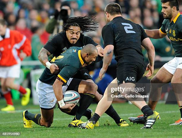 Cornal Hendricks of South Africa and Ma'a Nonu of New Zealand in action during The Castle Lager Rugby Championship 2015 match between South Africa...