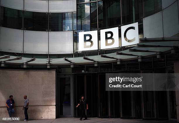 The people stand outside the Broadcasting House, the headquarters of the BBC on July 25, 2015 in London, England. The main Art Deco-style building of...