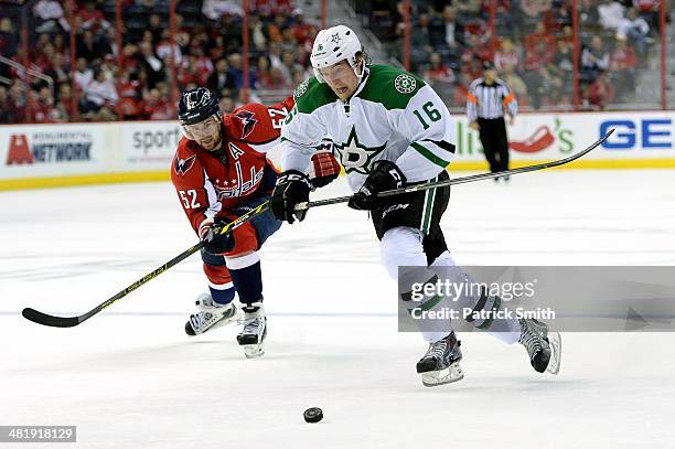 Ryan Garbutt of the Dallas Stars skates past Mike Green of the Washington Capitals before scoring a shorthanded goal in the third period during an...