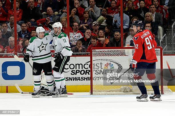 Ray Whitney celebrates with Dustin Jeffrey of the Dallas Stars after scoring a goal in the second period during an NHL game against the Washington...