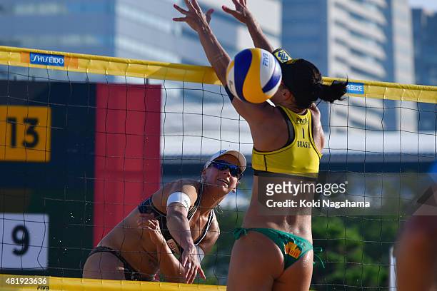 Marleen Van Iersel of Netherlands attacks the ball in the main draw match against Agatha Bednarczuk and Barbara Seixas De Freitas of Brazil during...
