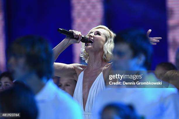 Singer Polina Gagarina performs at the Preliminary Draw of the 2018 FIFA World Cup in Russia at The Konstantin Palace on July 25, 2015 in Saint...