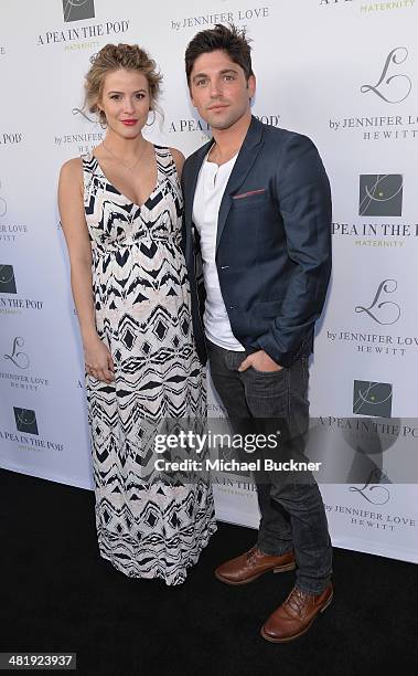 Actress Linsey Godfrey and acotr Robert Adamson arrives at the Launches of Jennifer Love Hewitt's new maternity line, "L by Jennifer Love Hewitt" at...