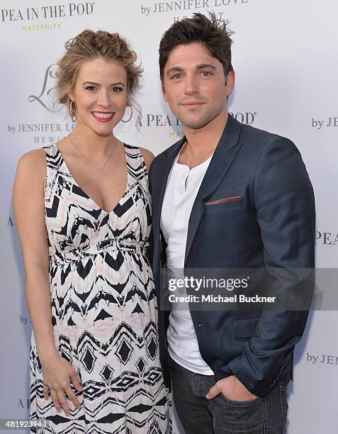 Actress Linsey Godfrey and acotr Robert Adamson arrives at the Launches of Jennifer Love Hewitt's new maternity line, "L by Jennifer Love Hewitt" at...