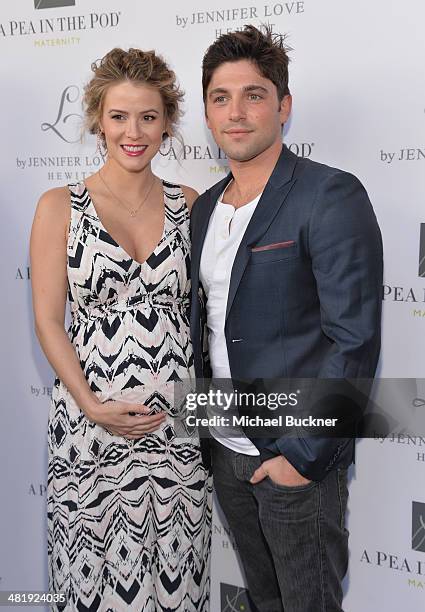 Actress Linsey Godfrey and acotr Robert Adamson arrives at the Launches of Jennifer Love Hewitt's new maternity line, "L by Jennifer Love Hewitt" at...