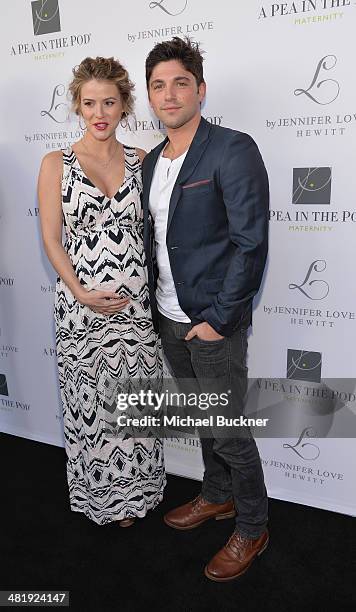 Actress Linsey Godfrey and acotr Robert Adamson arrives at the Launches of Jennifer Love Hewitt's new maternity line, "L by Jennifer Love Hewitt" at...