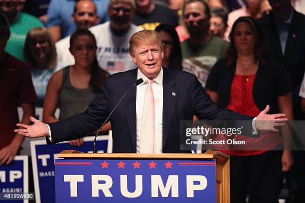 Republican presidential hopeful businessman Donald Trump speaks to guests gathered for a rally on July 25, 2015 in Oskaloosa, Iowa. During his last...