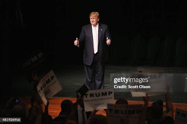 Republican presidential hopeful businessman Donald Trump greets guests gathered for a rally on July 25, 2015 in Oskaloosa, Iowa. During his last...