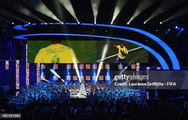 Singer Polina Gagarina performs at the Preliminary Draw of the 2018 FIFA World Cup in Russia at The Konstantin Palace on July 25, 2015 in Saint...