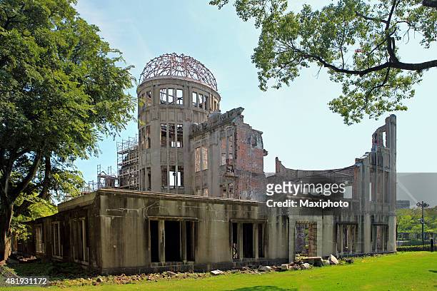 atomic bomb memorial building in hiroshima, japan - 1945 2015 stock pictures, royalty-free photos & images