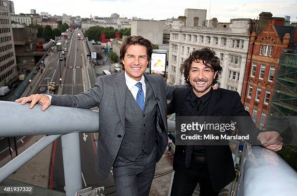 Tom Cruise and Alex Zane on the roof of the IMAX cinema as he attends the UK Fan Screening of 'Mission: Impossible - Rogue Nation' at the IMAX...