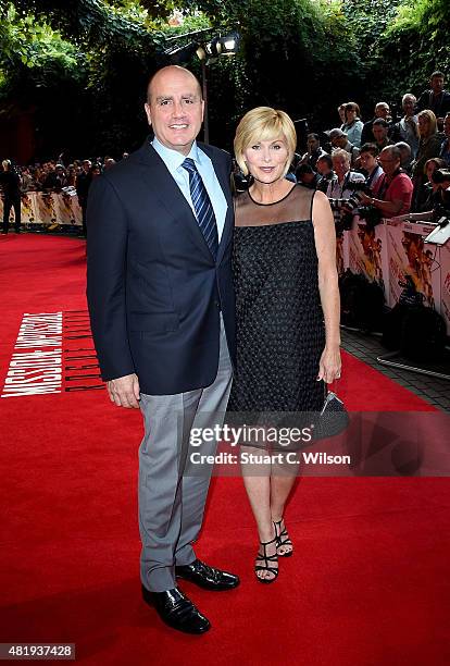 Producer Don Granger and wife Lisa McRee attend the UK Fan Screening of 'Mission: Impossible - Rogue Nation' at the IMAX Waterloo on July 25, 2015 in...