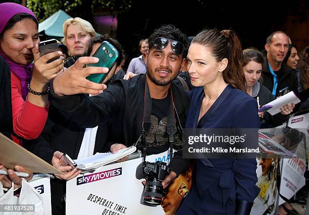 Rebecca Ferguson attends the UK Fan Screening of 'Mission: Impossible - Rogue Nation' at the IMAX Waterloo on July 25, 2015 in London, United Kingdom.