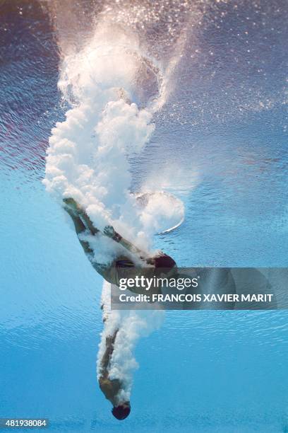 Picture taken witn an underwater camera shows Brazil's Ingrid Oliveira and Luis Felipe Outerelo competing in the 10m platform synchronised mixed...