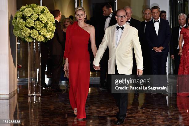 Princess Charlene of Monaco and Prince Albert II of Monaco arrive at the Monaco Red Cross Gala on July 25, 2015 in Monte-Carlo, Monaco.