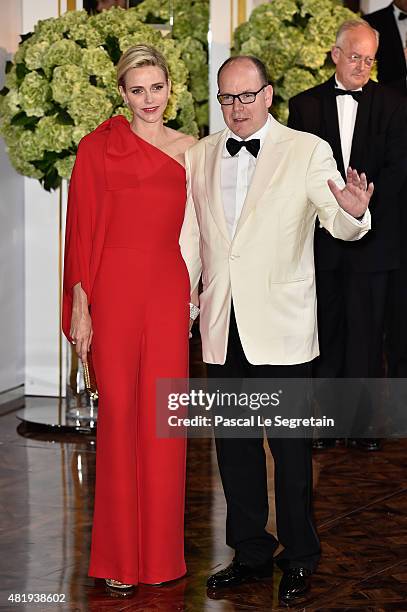 Princess Charlene of Monaco and Prince Albert II of Monaco arrive at the Monaco Red Cross Gala on July 25, 2015 in Monte-Carlo, Monaco.