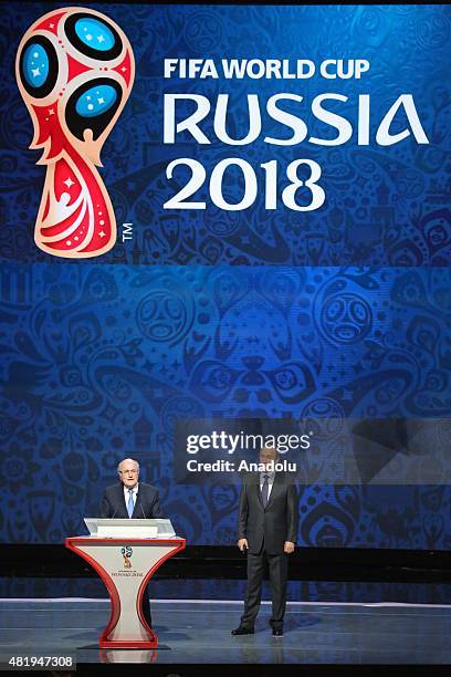 President Sepp Blatter speaks next to Russian President Vladimir Putin during the preliminary draw for the 2018 World Cup qualifiers at the...