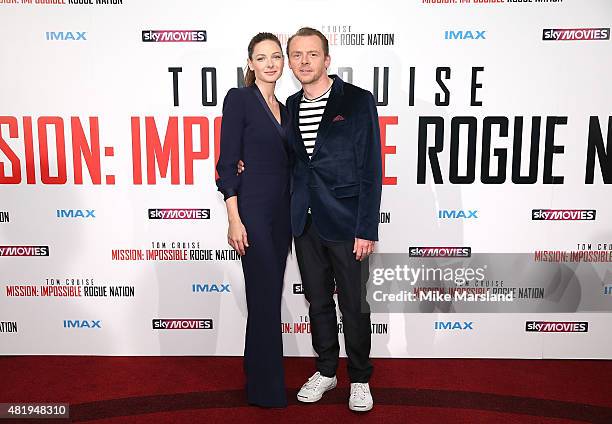 Rebecca Ferguson and Simon Pegg attend the UK Fan Screening of 'Mission: Impossible - Rogue Nation' at the IMAX Waterloo on July 25, 2015 in London,...