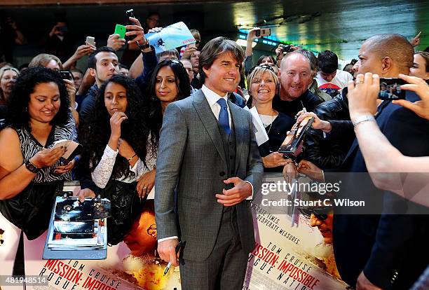 Tom Cruise with fans as he attends the UK Fan Screening of 'Mission: Impossible - Rogue Nation' at the IMAX Waterloo on July 25, 2015 in London,...