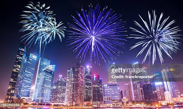 aerial view of the singapore skyline and marina bay - marina bay - singapore stock pictures, royalty-free photos & images