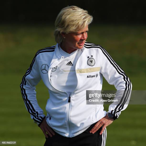 Head coach Silvia Neid of Germany looks on during a Germany Women's training session at the Commerzbank Arena training ground on April 2, 2014 in...