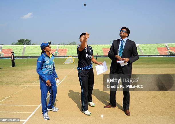 Shashikala Siriwardena captain of Sri Lanka , Suzie Bates captain of New Zealand and ICC match referee Javagal Srinath during the toss before the...