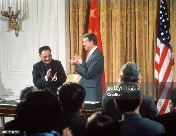 Chinese modernizer Deng Xiaoping and US President Jimmy Carter, smile 31 January 1979 in White House in Washington D.C., during China's Paramount...