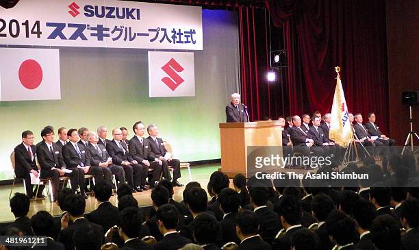 Suzuki Motor Co Chairman and president Osamu Suzuki speaks to new emploees during a welcoming ceremony on April 1, 2014 in Hamamatsu, Shizuoka,...