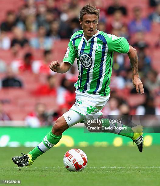 Max Kruse of Wolfsburg runs with the ball during the Emirates Cup match between VfL Wolfsburg and Villareal at the Emirates Stadium on July 25, 2015...