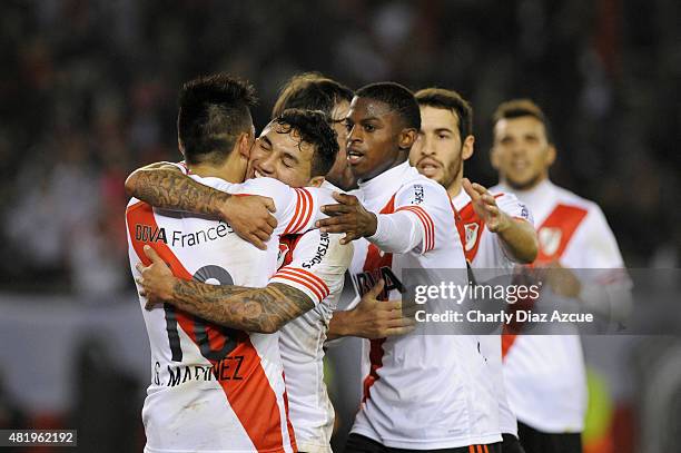 Tabare Viudez of River Plate celebrates with teammates after scoring his team's third goal during a match between River Plate and Colon de Santa Fe...