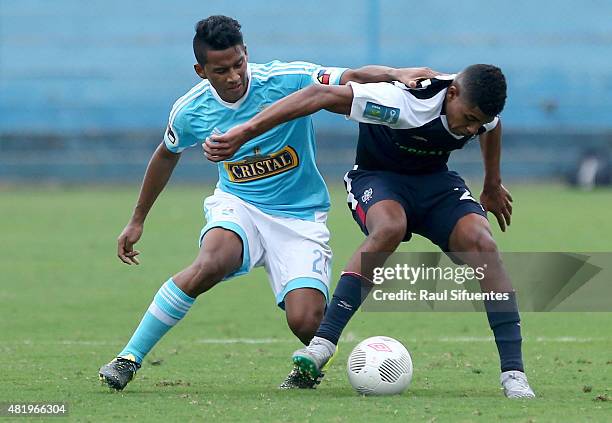 Josue Estrada of Sporting Cristal struggles for the ball with Wilder Cartagena of San Martin during a match between Sporting Cristal and San Martin...