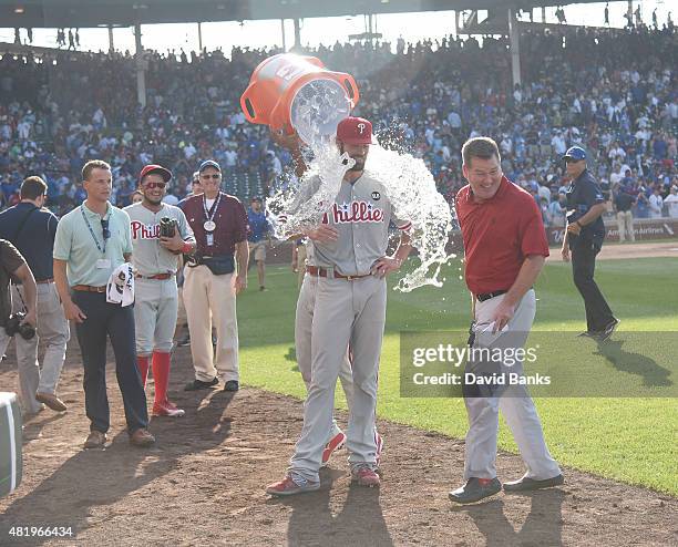 Cole Hamels of the Philadelphia Phillies gets a ice water bath after his no hitter on July 25, 2015 at Wrigley Field in Chicago, Illinois. Hamels...