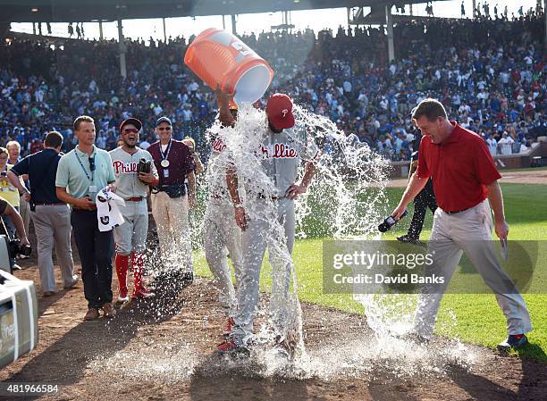 Cole Hamels of the Philadelphia Phillies gets a ice water bath after his no hitter on July 25, 2015 at Wrigley Field in Chicago, Illinois. Hamels...