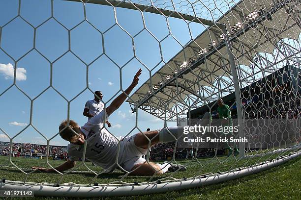 Tim Ream of the United States slides into the net after blocking a shot against Panama in the second half during the CONCACAF Gold Cup Third Place...