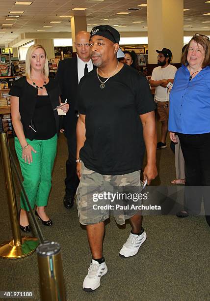 Rapper Chuck D of the Rap Group "Public Enemy" signs copys of his new album "Man Plans God Laughs" at Barnes & Noble at The Grove on July 25, 2015 in...