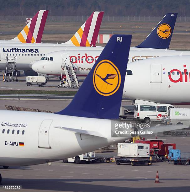 Passenger planes of Lufthansa and Germanwings stand on the tarmac at Tegel Airport during a strike by Lufthansa and Germanwings pilots on April 2,...