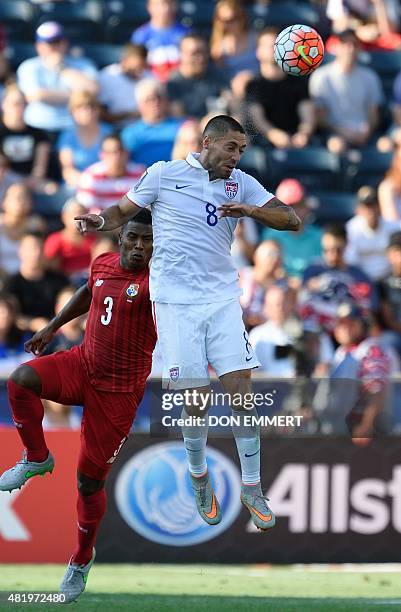 Player Clint Dempsey heads the ball way from Panama's Harold Cummings during the 2015 CONCACAF Gold Cup third place match between the USA and Panama...