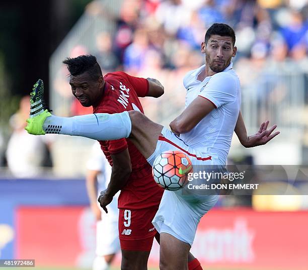 Player Omar Gonzalez and Panama's Roberto Nurse fight for the ball during the 2015 CONCACAF Gold Cup third place match between the USA and Panama...