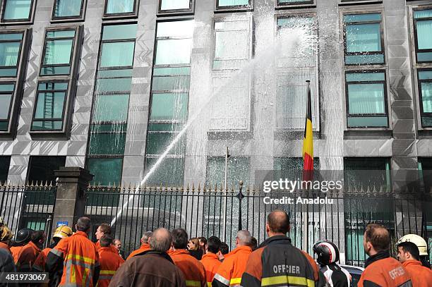 Firefighters stage a protest demanding better working conditions, in central Brussels April 2, 2014 in Brussels, Belgium. Around 150 firefighters...