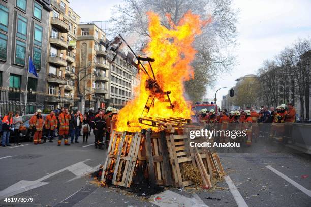 Firefighters stage a protest demanding better working conditions, in central Brussels April 2, 2014 in Brussels, Belgium. Around 150 firefighters...