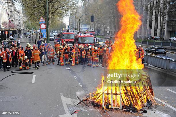 Firefighters stage a protest demanding better working conditions, in central Brussels April 2, 2014 in Brussels, Belgium. Around 150 firefighters...