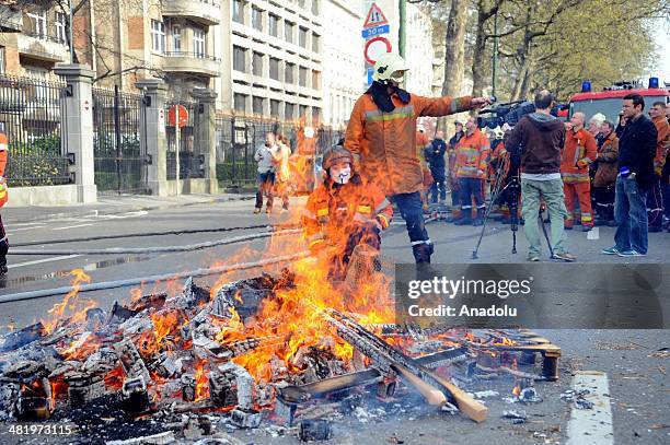 Firefighters stage a protest demanding better working conditions, in central Brussels April 2, 2014 in Brussels, Belgium. Around 150 firefighters...