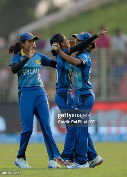 Udeshika Prabodani of Sri Lanka celebrates the wicket of Sophie Devine of New Zealand during the ICC Women's World Twenty20 playoff match 1 between...