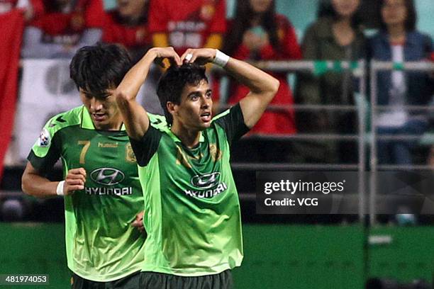 Leonardo of Jeonbuk Hyundai Motors celebrates after scoring his team's first goal during the AFC Champions League match between Jeonbuk Hyundai...