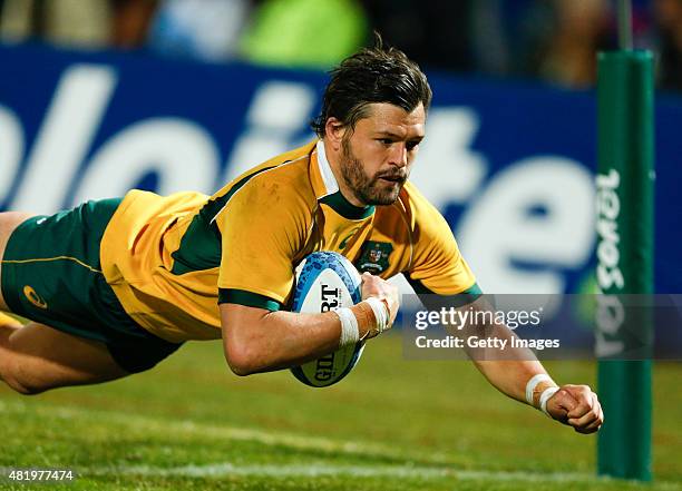 Adam Ashley-Cooper of Australia dives for a try during a match between Australia and Argentina as part of The Rugby Championship 2015 at Estadio...