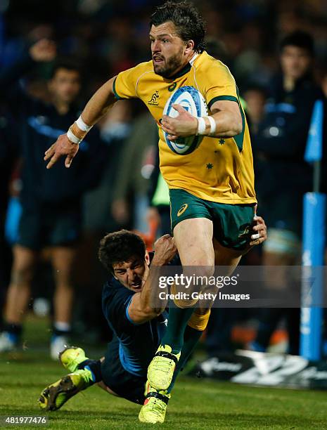 Adam Ashley-Cooper of Australia fights for the ball with Tomas Cubelli of Argentina during a match between Australia and Argentina as part of The...