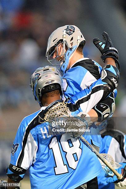 Tom Schreiber of the Ohio Machine celebrates with Kyle Harrison of the Ohio Machine after Schreiber scored a fourth quarter goal against the Boston...